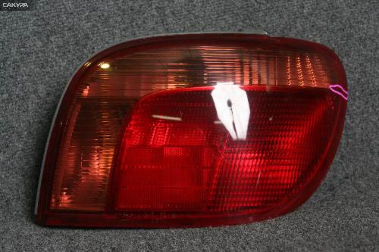 Фонарь стоп-сигнала правый Toyota Vitz SCP13 2SZ-FE 52-041: купить в Сакура Красноярск.