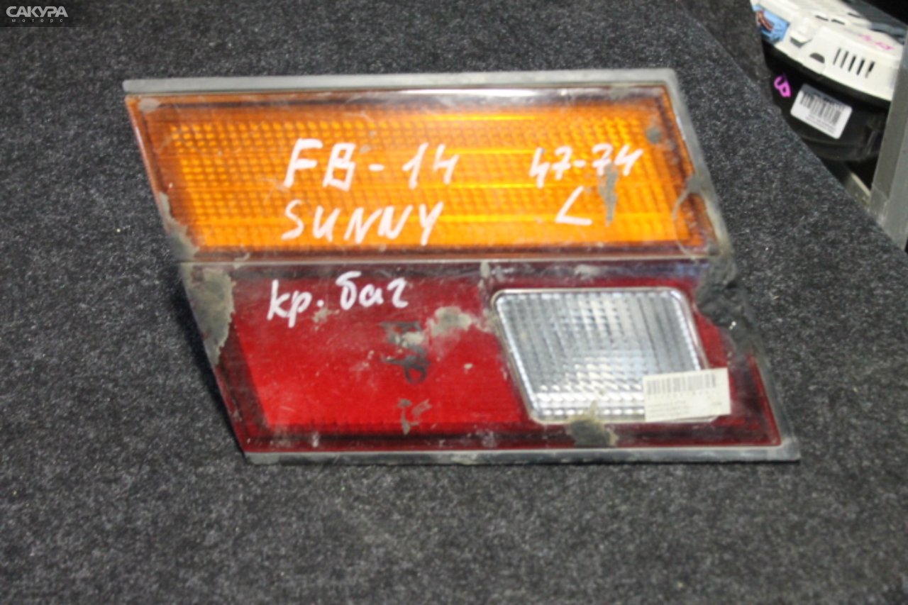 Фонарь вставка багажника левый Nissan Sunny B14 4774: купить в Сакура Красноярск.