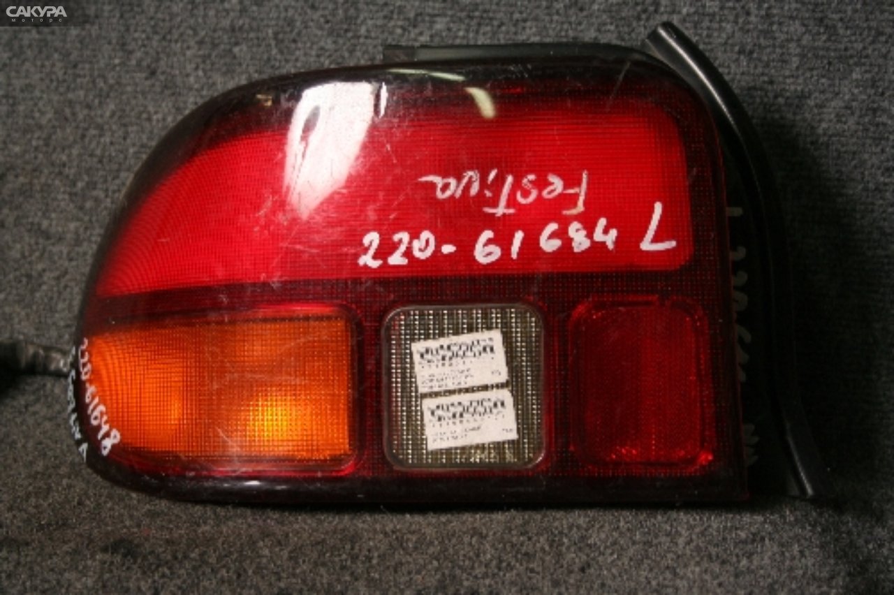 Фонарь стоп-сигнала левый Ford Festiva D25PF 220-61684: купить в Сакура Красноярск.