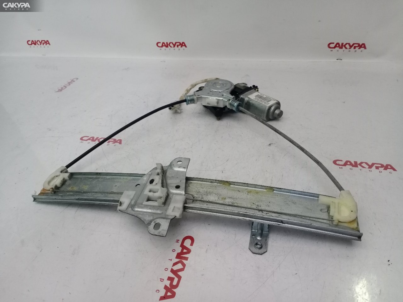 Стеклоподъемник задний левый Suzuki Aerio RB21S M15A: купить в Сакура Красноярск.