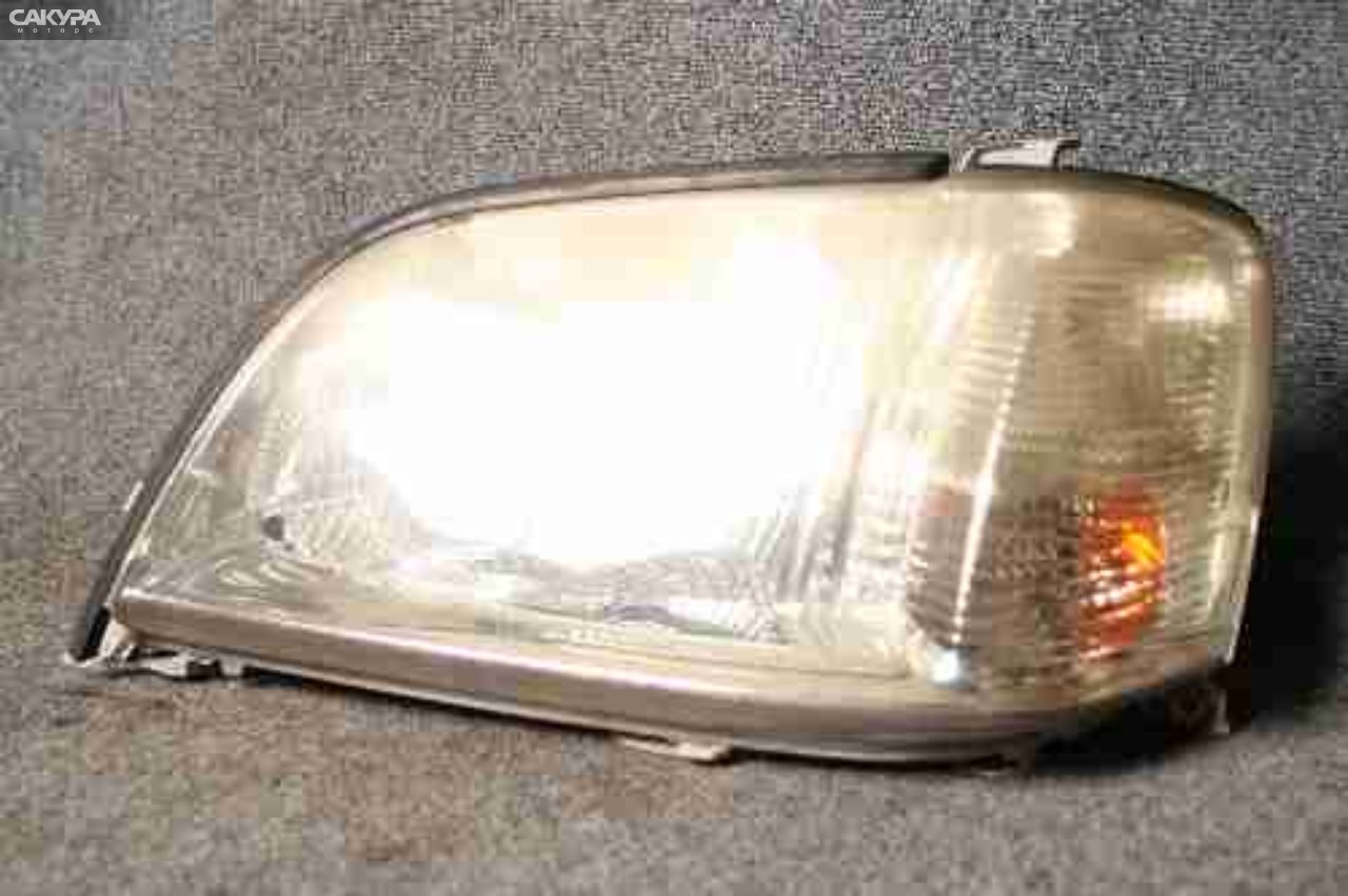 Фара левая Toyota Crown JZS175 100-76941: купить в Сакура Красноярск.