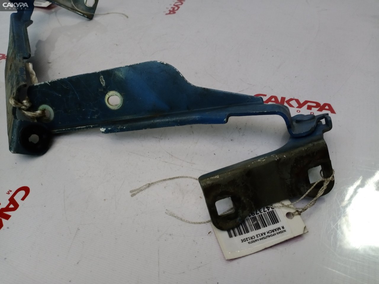 Кронштейн капота правый Nissan March AK12 CR12DE: купить в Сакура Красноярск.