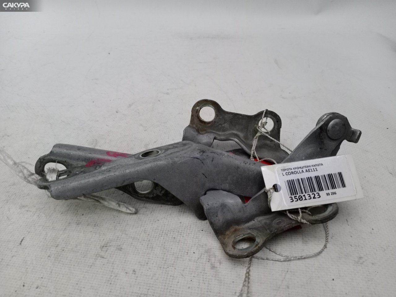 Кронштейн капота левый Toyota Corolla AE111: купить в Сакура Красноярск.