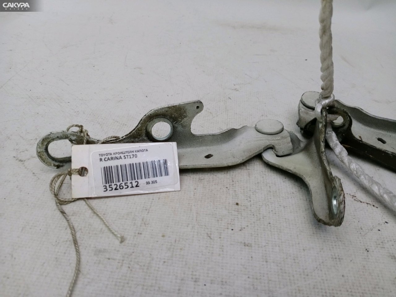 Кронштейн капота правый Toyota Carina ST170: купить в Сакура Красноярск.