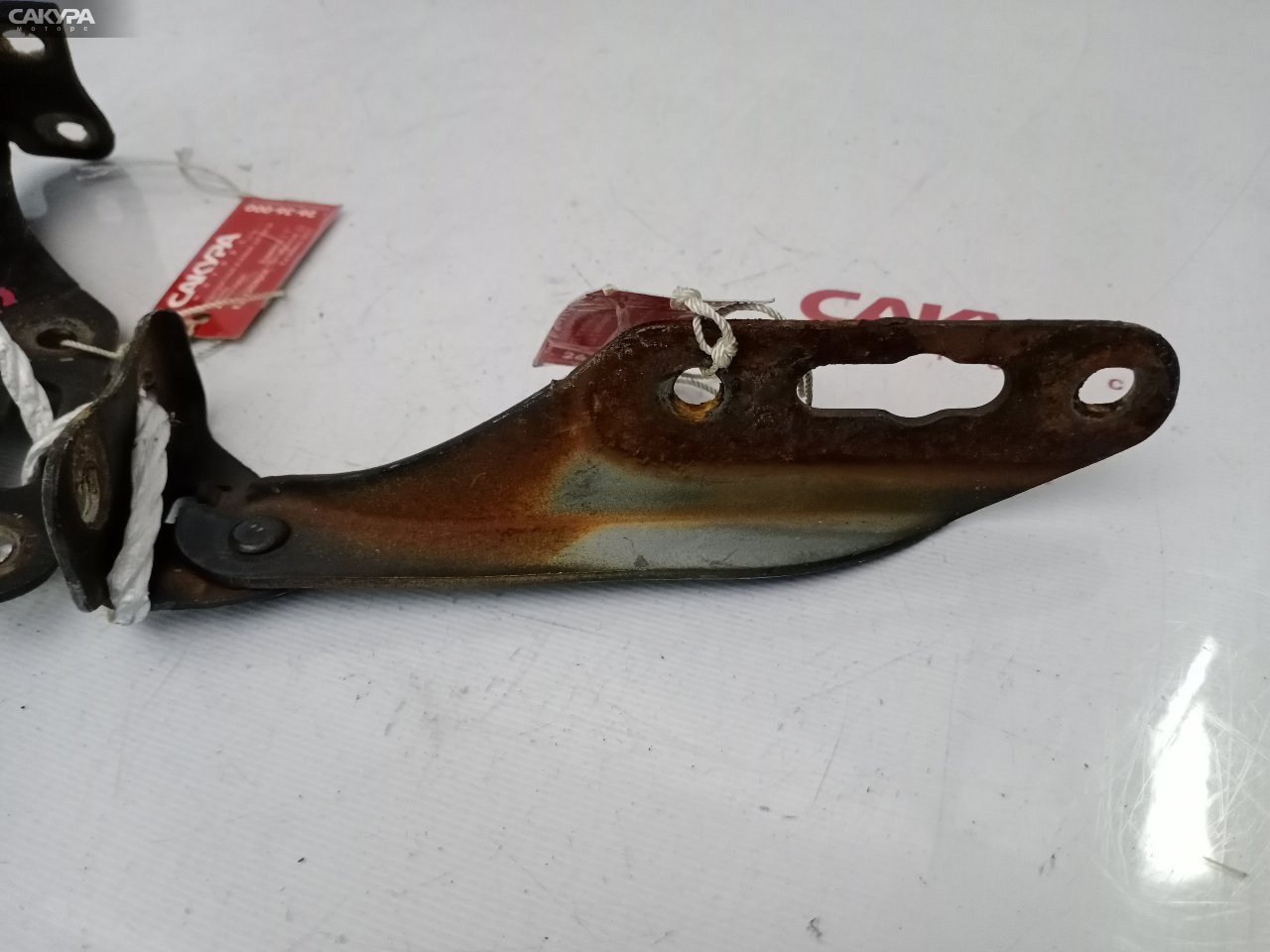 Кронштейн капота правый Honda Logo GA3 D13B: купить в Сакура Красноярск.