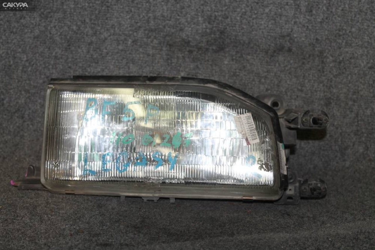 Фара правая Mazda Familia BF5P 110-61247: купить в Сакура Красноярск.