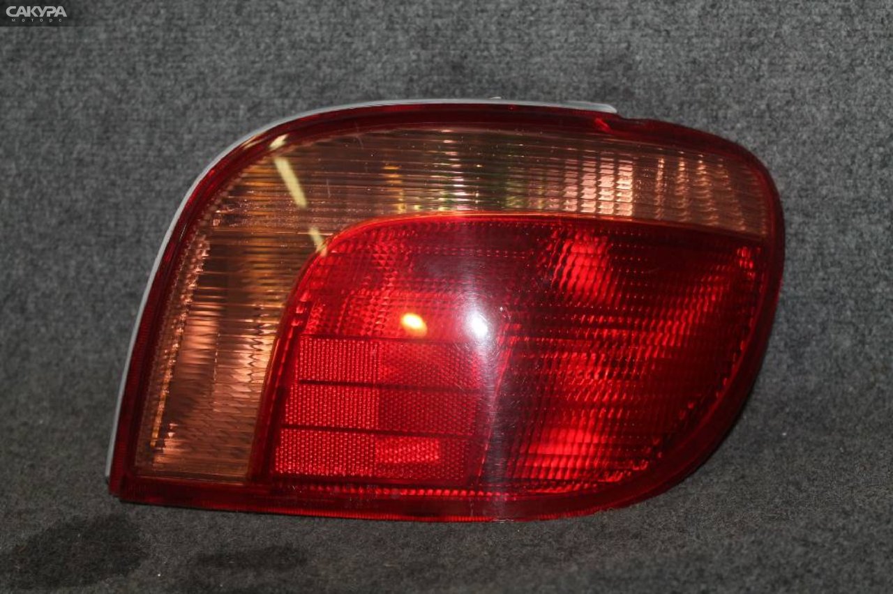 Фонарь стоп-сигнала правый Toyota Vitz NCP13 1NZ-FE 52-041: купить в Сакура Красноярск.