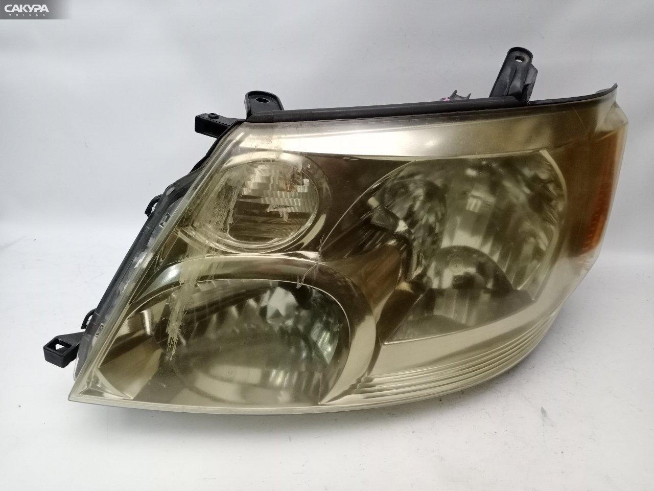 Фара левая Toyota Alphard MNH10W 58-2: купить в Сакура Красноярск.