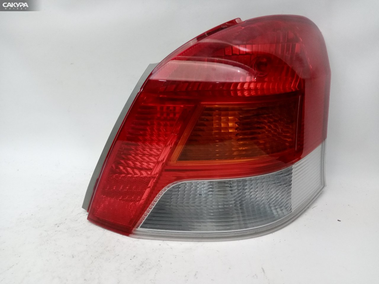 Фонарь стоп-сигнала правый Toyota Vitz SCP90 1KR-FE 52-185: купить в Сакура Красноярск.