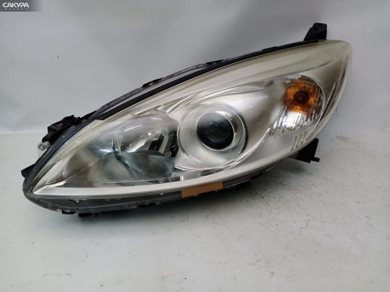 Фара левая Nissan Lafesta CWEFWN P9562: купить в Сакура Красноярск.