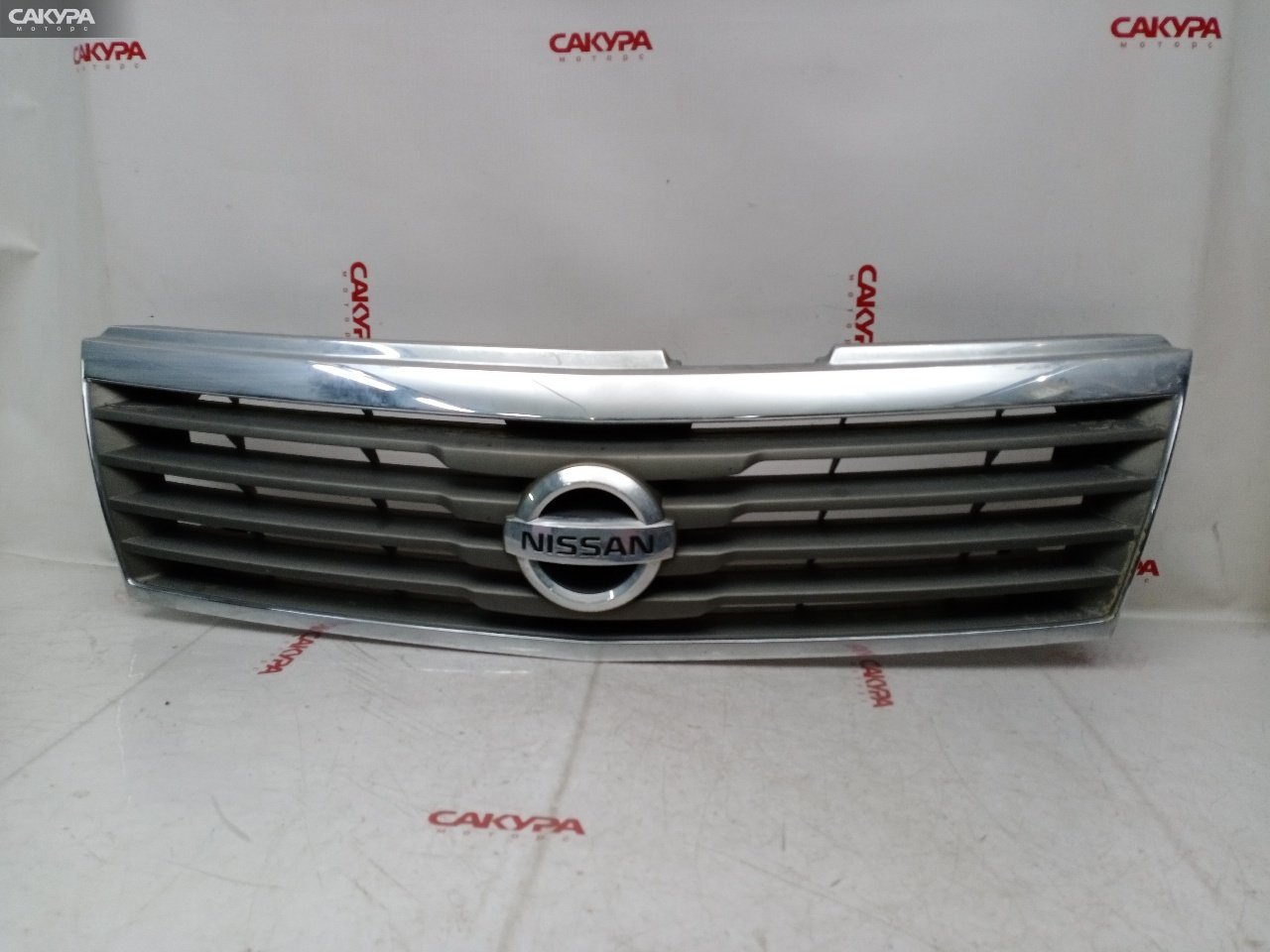 Решетка радиатора Nissan Liberty RNM12 QR20DE: купить в Сакура Красноярск.