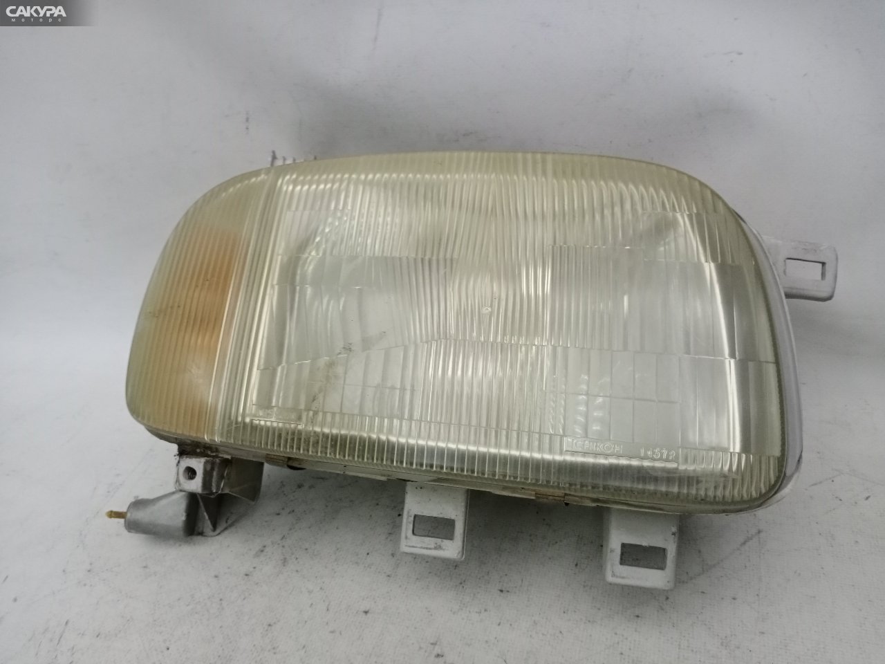Фара правая Nissan March K11 1457: купить в Сакура Красноярск.