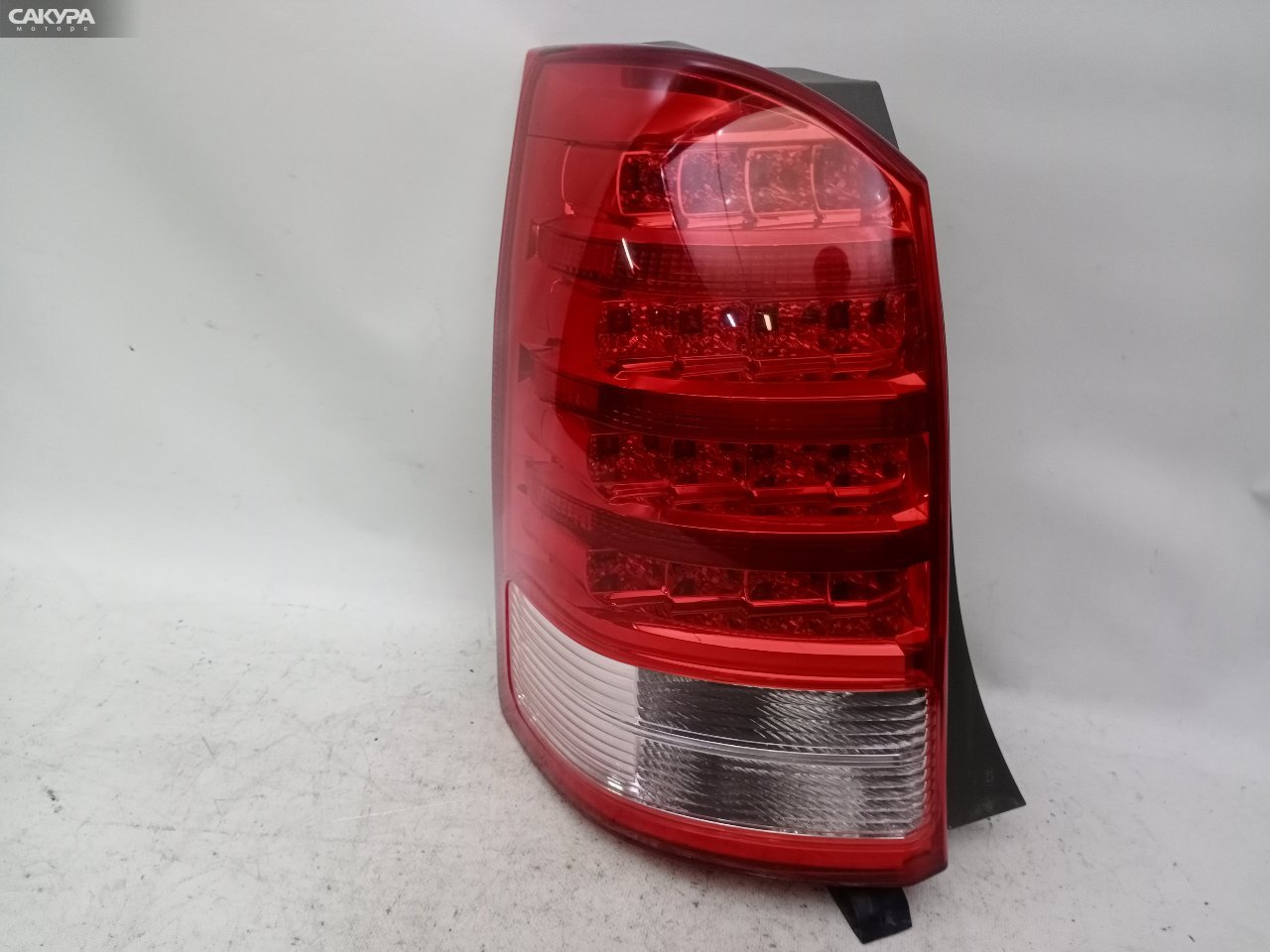 Фонарь стоп-сигнала левый Toyota Wish ZNE10G 68-14: купить в Сакура Красноярск.