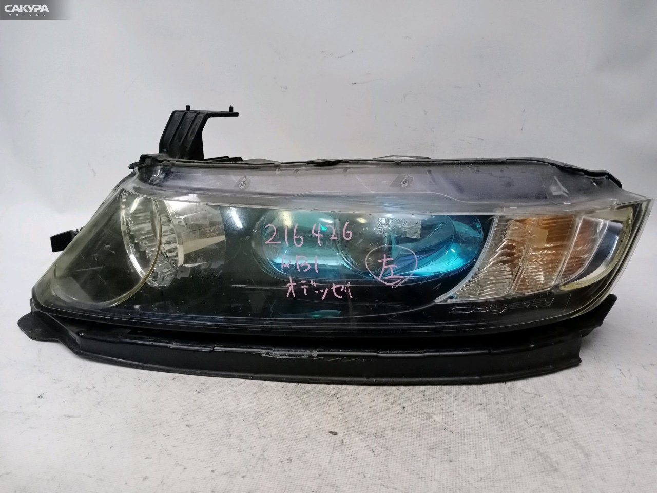 Фара левая Honda Odyssey RB1 K24A 100-22497: купить в Сакура Красноярск.