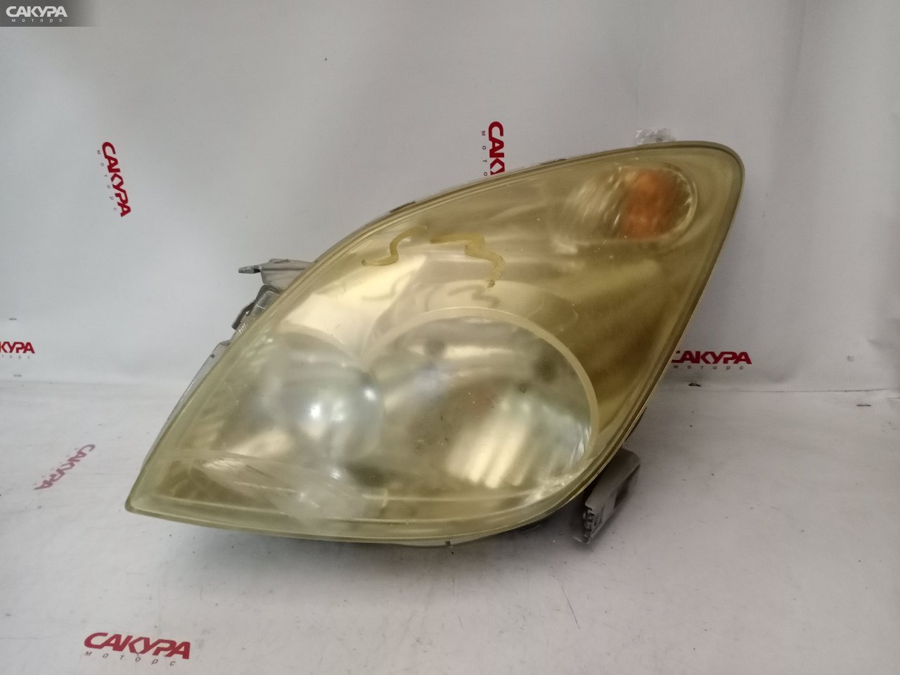 Фара левая Toyota Corolla Spacio ZZE122N 13-84: купить в Сакура Красноярск.