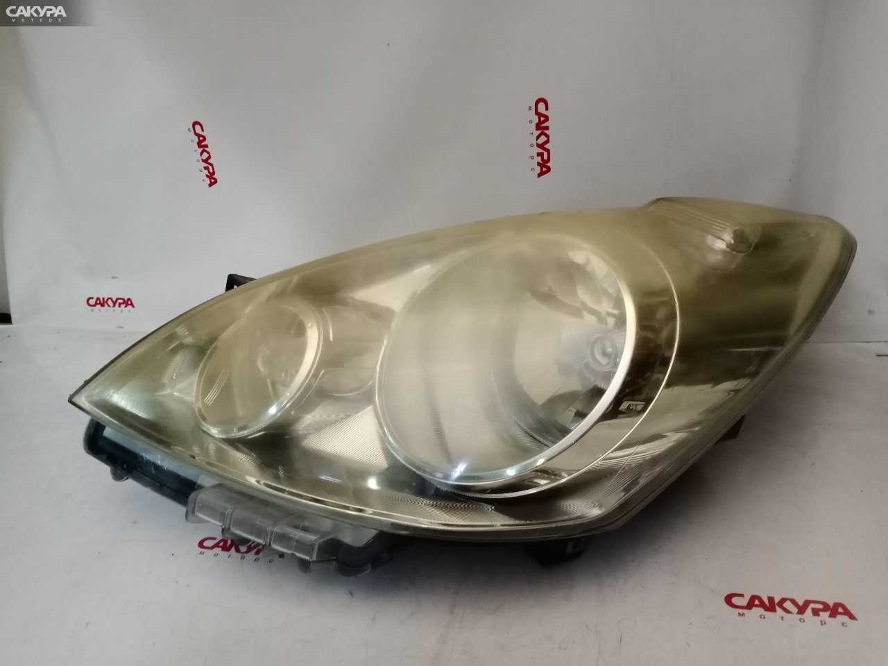 Фара левая Nissan Note E11 H005: купить в Сакура Красноярск.