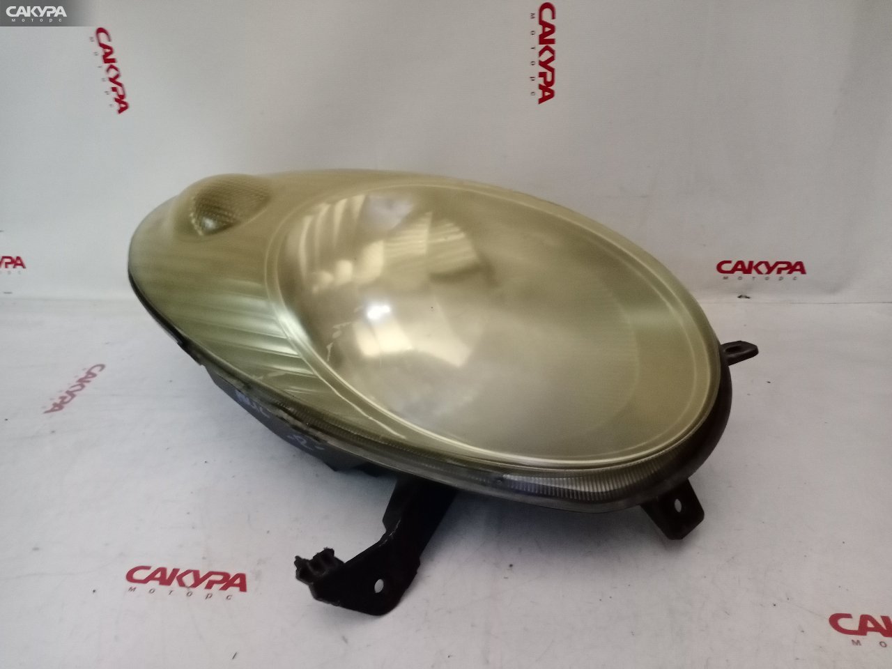 Фара правая Nissan March AK12 CR12DE 1704: купить в Сакура Красноярск.