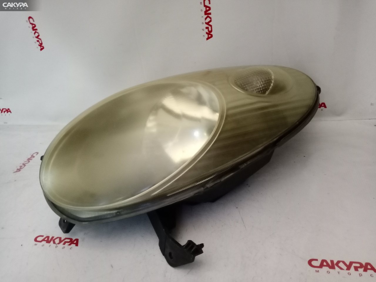 Фара левая Nissan March AK12 CR12DE 1704: купить в Сакура Красноярск.