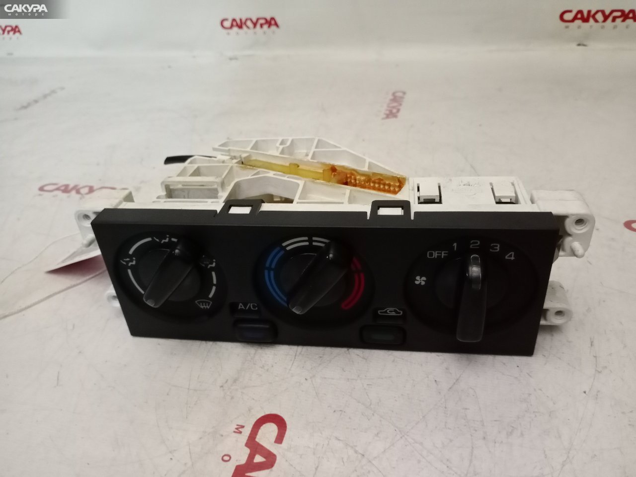 Блок управления климат-контролем Nissan Sunny FB14 GA15DE: купить в Сакура Красноярск.