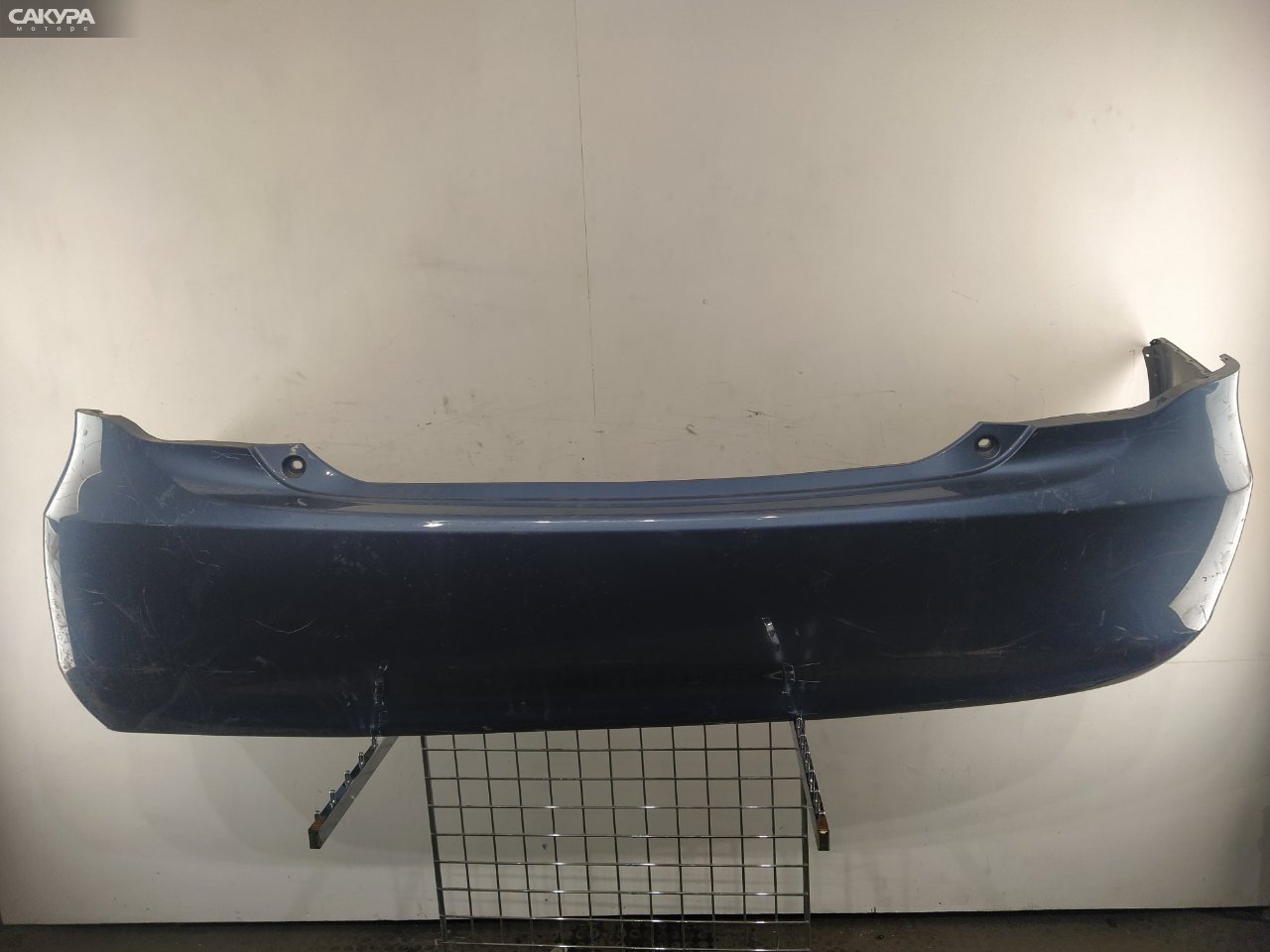Бампер задний Toyota Corolla Axio NZE141 1NZ-FE: купить в Сакура Красноярск.