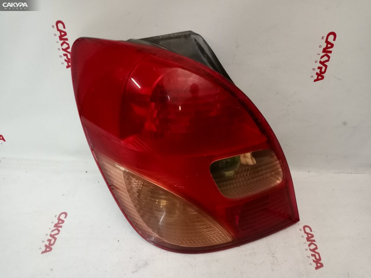 Фонарь стоп-сигнала левый Toyota Corolla Spacio NZE121N 13-69: купить в Сакура Красноярск.
