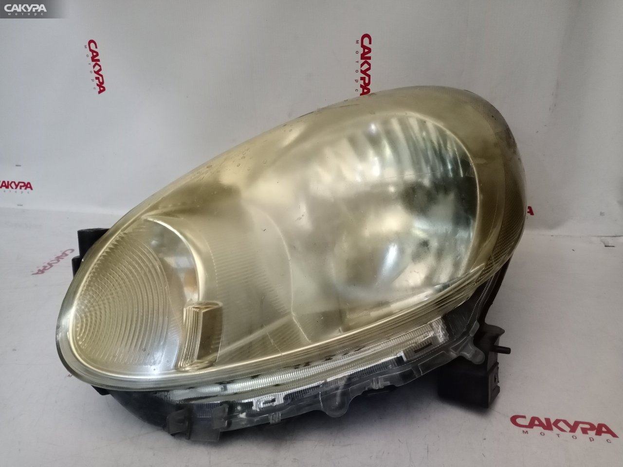 Фара левая Nissan March K13 H009: купить в Сакура Красноярск.