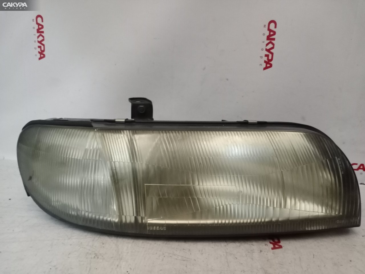 Фара правая Nissan Bluebird U13 GA16DS 1450: купить в Сакура Красноярск.