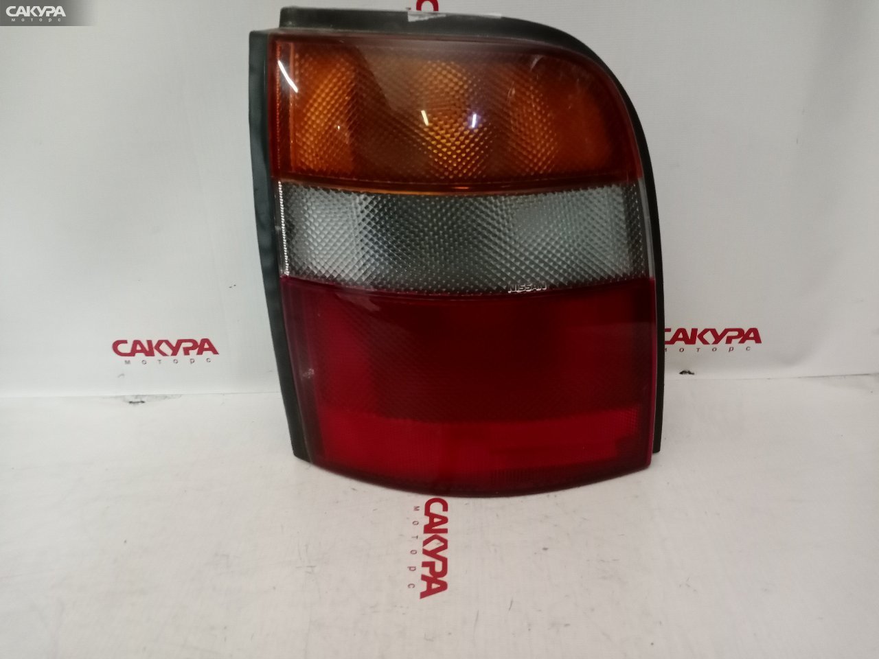 Фонарь стоп-сигнала левый Nissan March K11 4649: купить в Сакура Красноярск.
