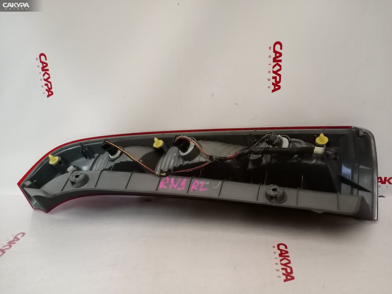 Фонарь стоп-сигнала левый Honda Stream RN3 K20A P1483: купить в Сакура Красноярск.