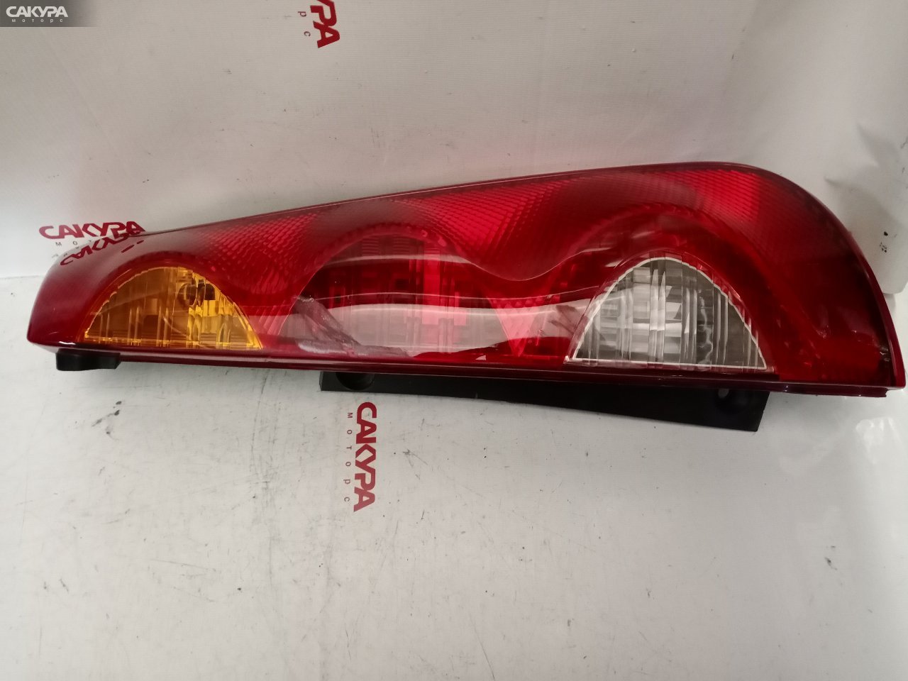 Фонарь стоп-сигнала правый Nissan Note E11 220-63780: купить в Сакура Красноярск.