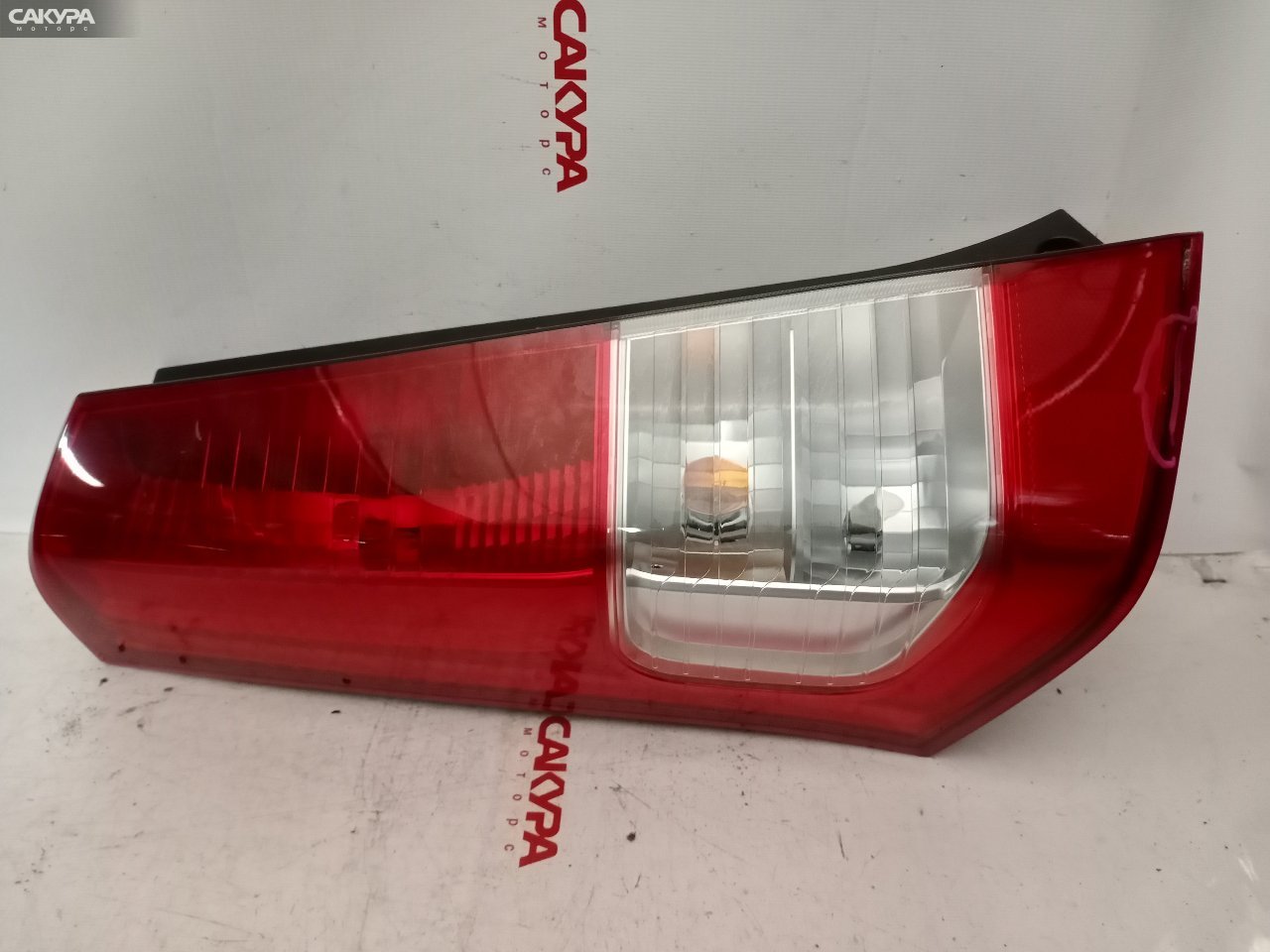 Фонарь стоп-сигнала левый Suzuki Wagon R MH23S 35603-70K0: купить в Сакура Красноярск.