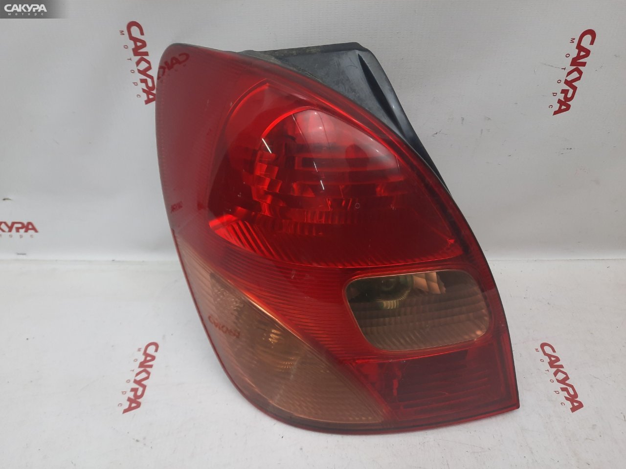 Фонарь стоп-сигнала левый Toyota Corolla Spacio NZE121N 1NZ-FE 13-69: купить в Сакура Красноярск.