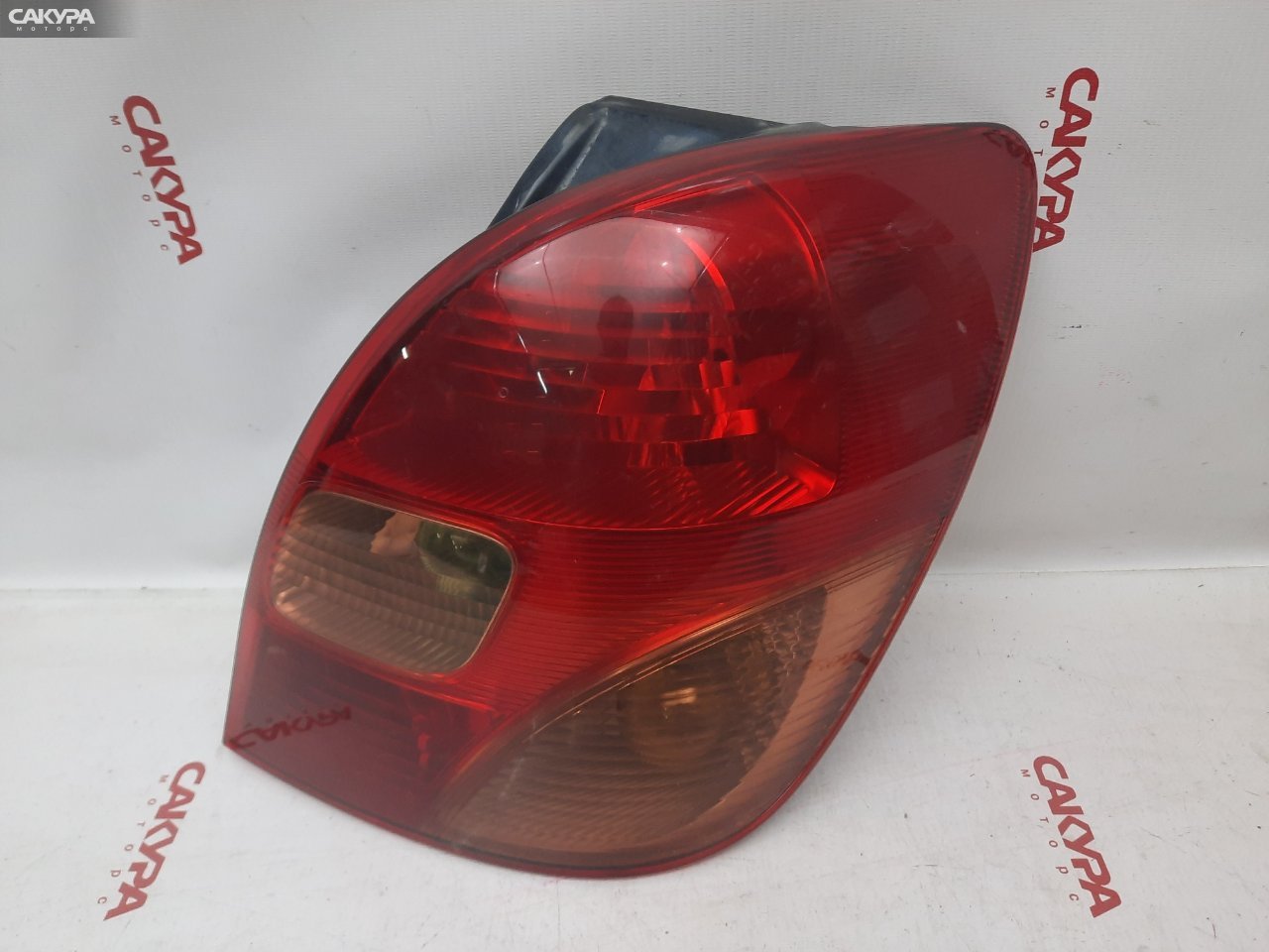 Фонарь стоп-сигнала правый Toyota Corolla Spacio NZE121N 1NZ-FE 13-69: купить в Сакура Красноярск.