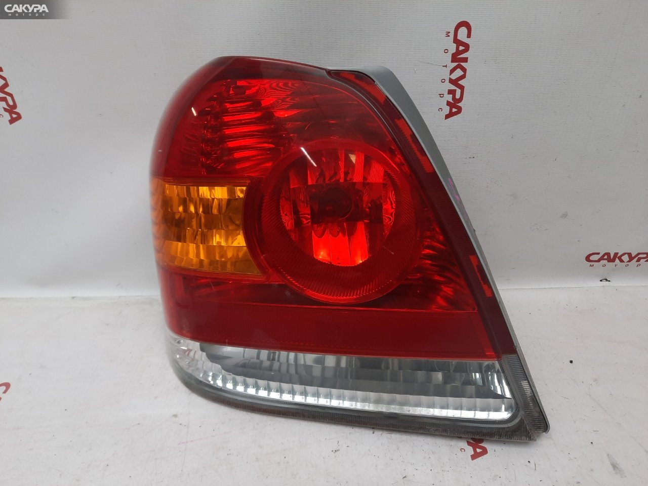 Фонарь стоп-сигнала левый Toyota Platz SCP11 52-071: купить в Сакура Красноярск.