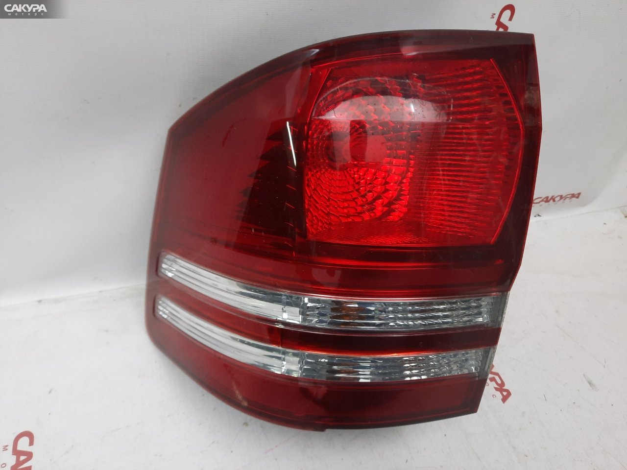 Фонарь стоп-сигнала правый Toyota Alphard ANH10W 58-18: купить в Сакура Красноярск.