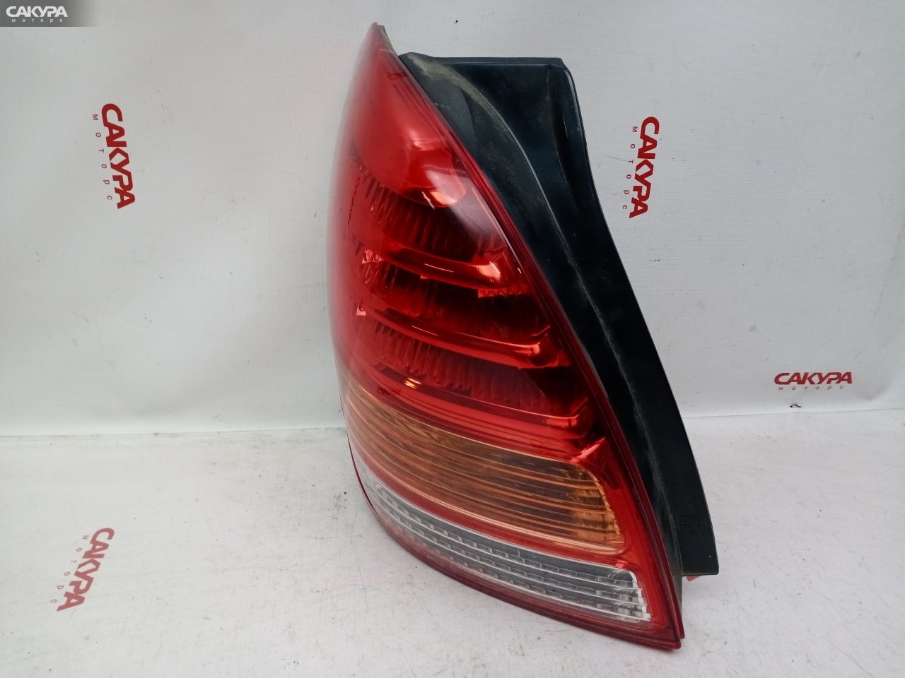 Фонарь стоп-сигнала левый Toyota Corolla Spacio NZE121N 1NZ-FE 13-85: купить в Сакура Красноярск.