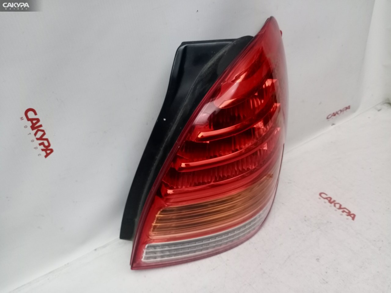 Фонарь стоп-сигнала правый Toyota Corolla Spacio NZE121N 1NZ-FE 13-85: купить в Сакура Красноярск.