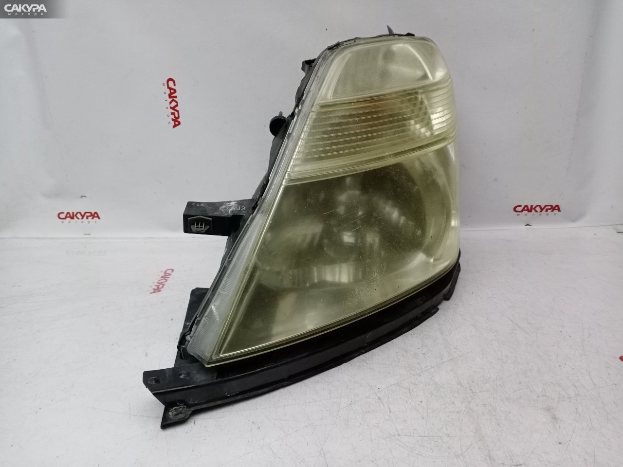 Фара левая Honda Stream RN4 K20A 100-22363: купить в Сакура Красноярск.