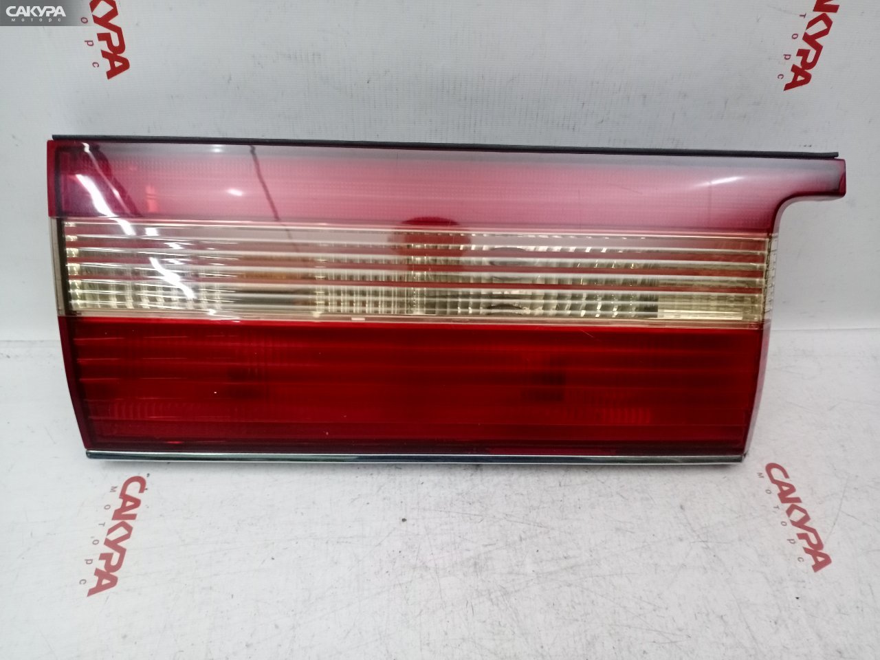 Фонарь вставка багажника левый Toyota Crown JZS151 1JZ-GE 30-212: купить в Сакура Красноярск.