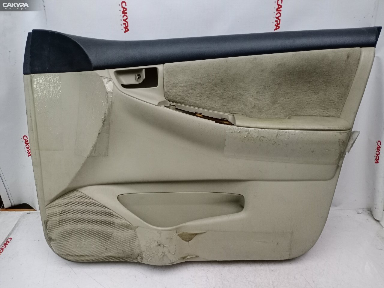 Обшивка двери передняя левая Toyota Corolla NZE121 1NZ-FE: купить в Сакура Красноярск.