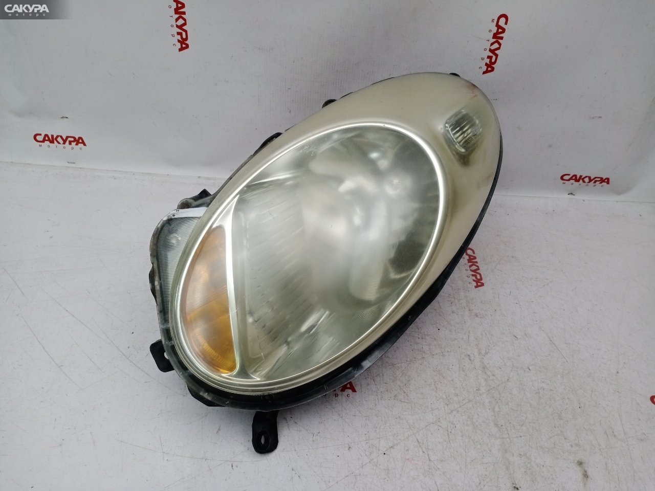Фара левая Nissan March AK12 CR12DE 1816: купить в Сакура Красноярск.