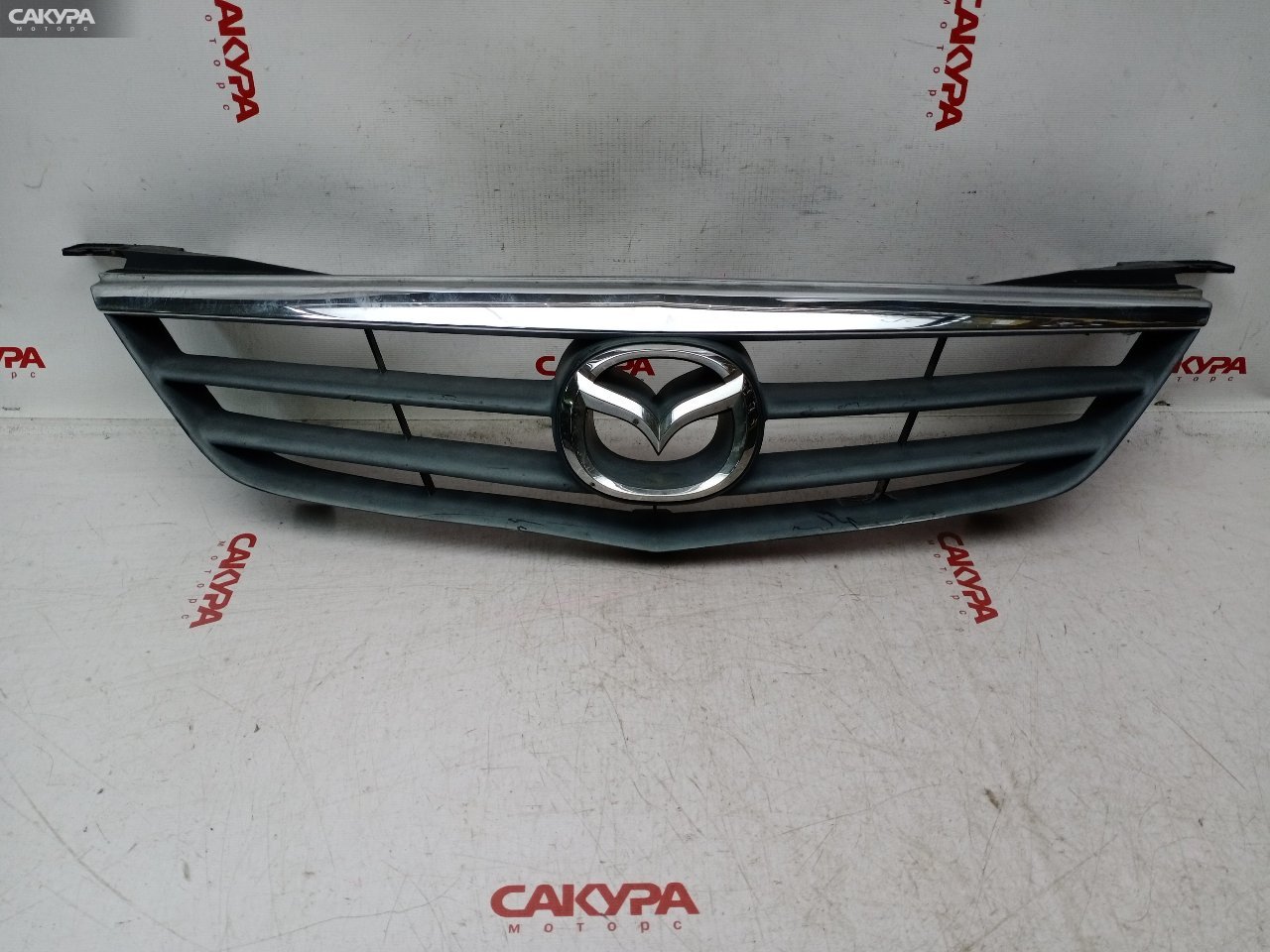 Решетка радиатора Mazda Capella GF8P FP-DE: купить в Сакура Красноярск.
