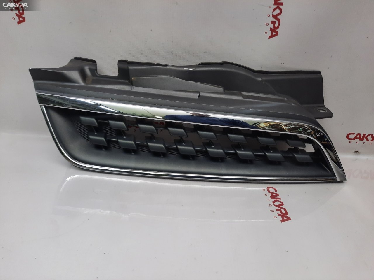 Решетка радиатора правая Nissan March AK12 CR12DE: купить в Сакура Красноярск.