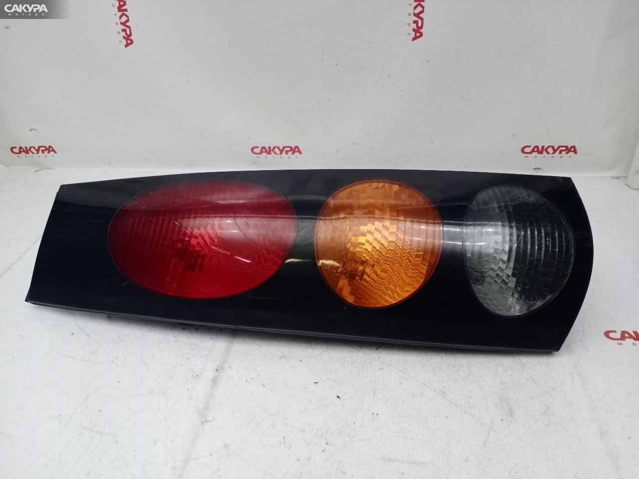 Фонарь стоп-сигнала левый Toyota Raum EXZ10 5E-FE 46-2: купить в Сакура Красноярск.