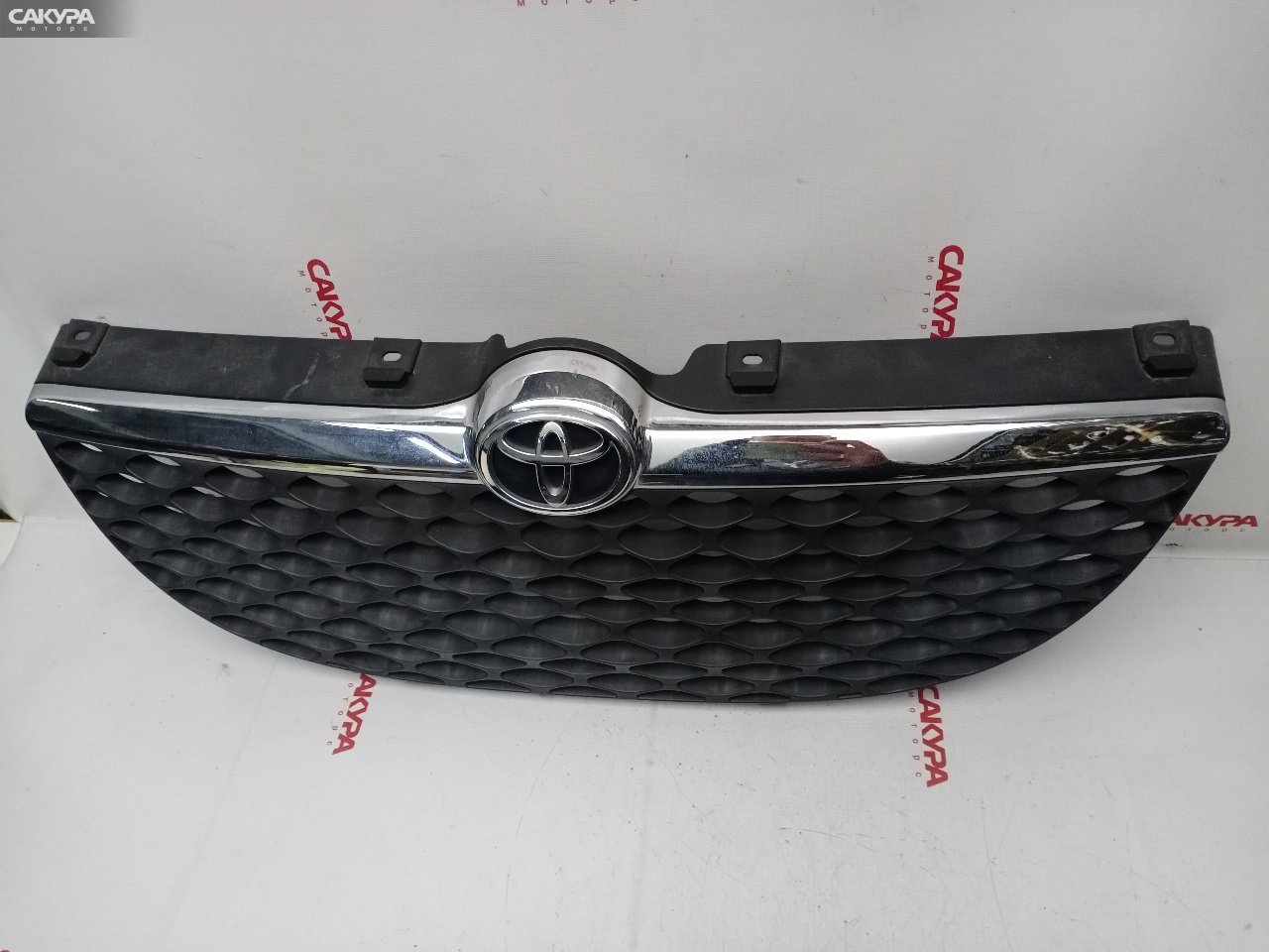Решетка радиатора Toyota Duet M100A EJ-VE: купить в Сакура Красноярск.