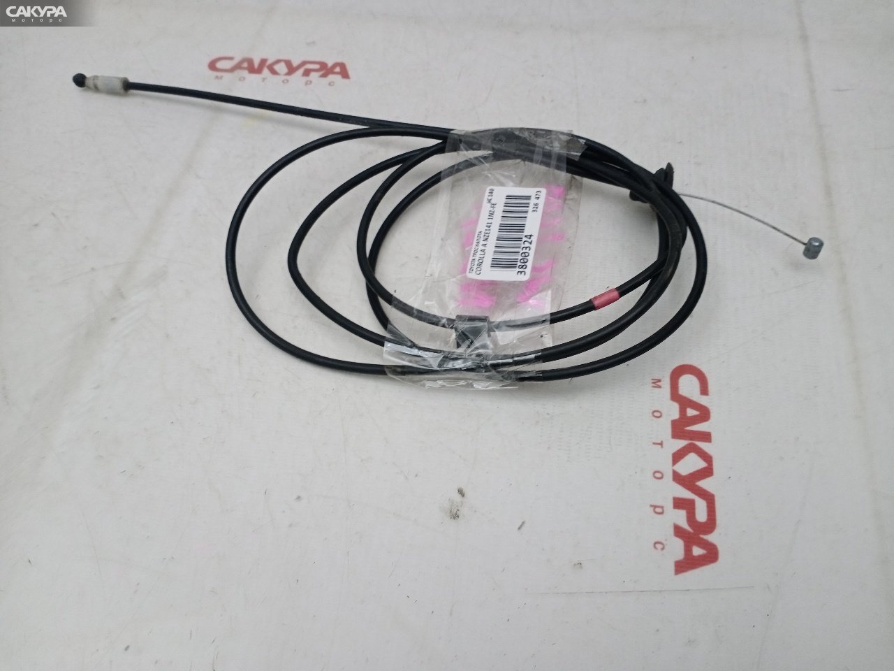 Трос капота Toyota Corolla Axio NZE141 1NZ-FE: купить в Сакура Красноярск.