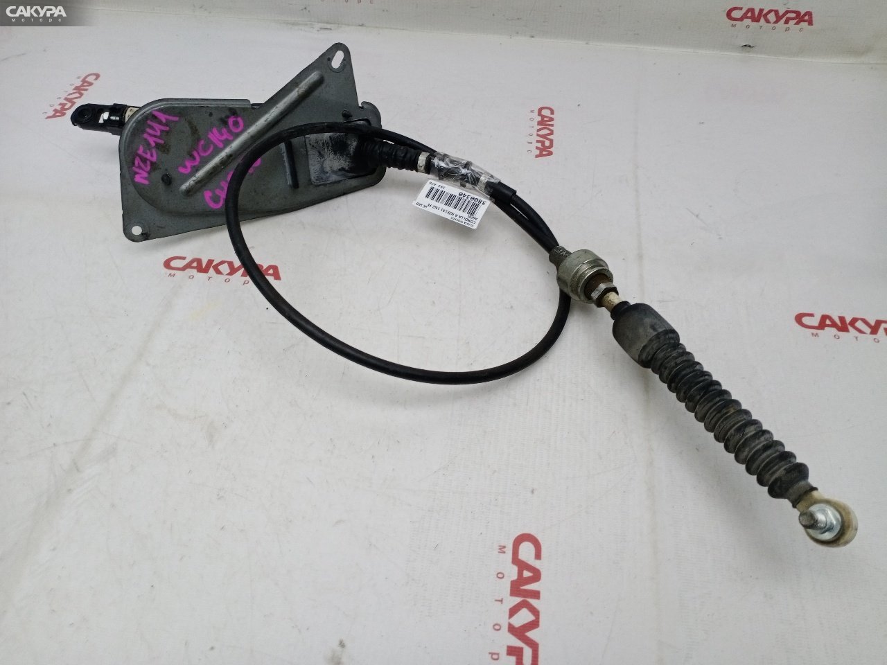 Трос КПП Toyota Corolla Axio NZE141 1NZ-FE: купить в Сакура Красноярск.
