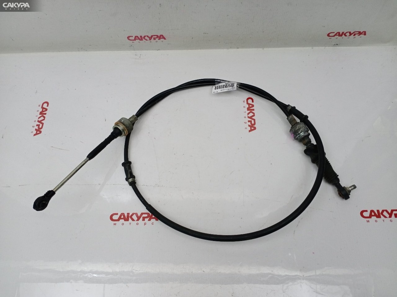 Трос КПП Nissan March AK12 CR12DE: купить в Сакура Красноярск.