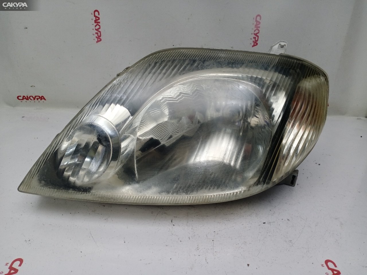 Фара левая Toyota Corolla Fielder NZE124G 1NZ-FE 12-489: купить в Сакура Красноярск.