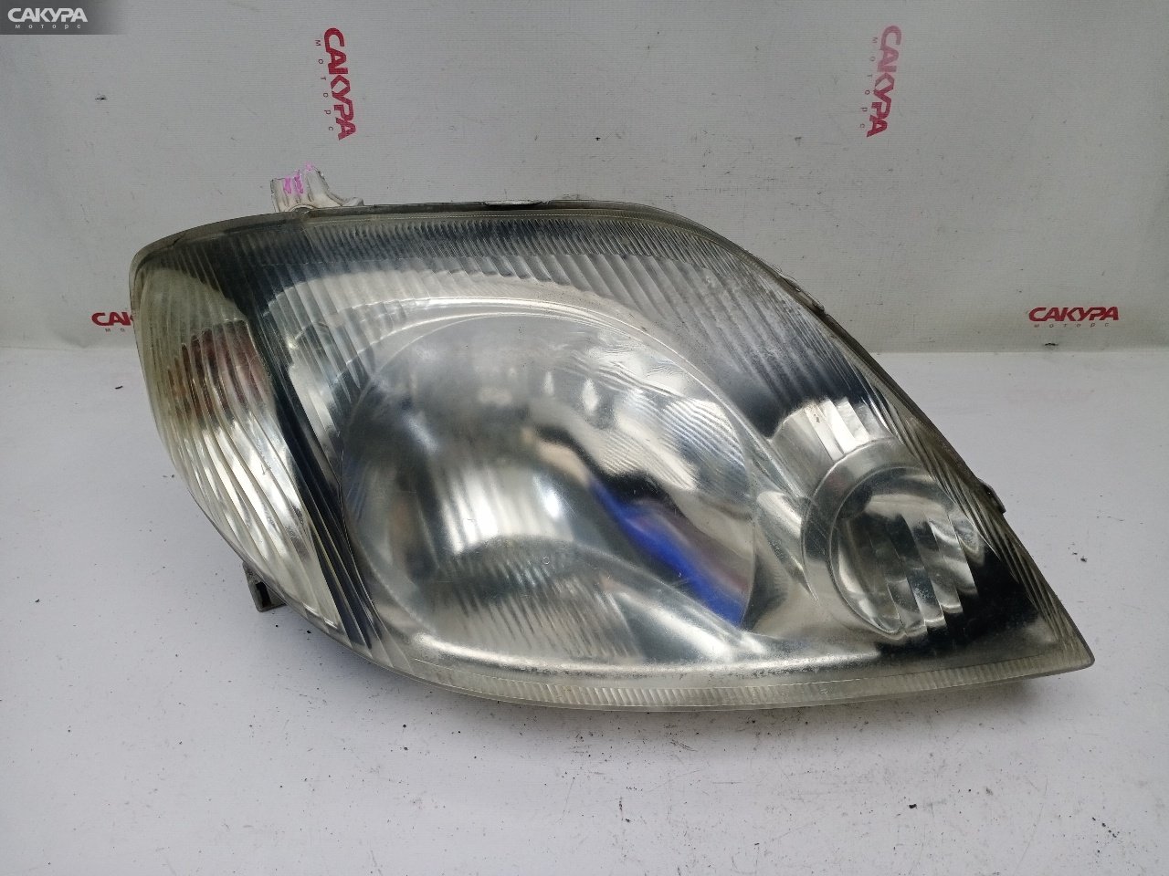 Фара правая Toyota Corolla Fielder NZE124G 1NZ-FE 12-489: купить в Сакура Красноярск.
